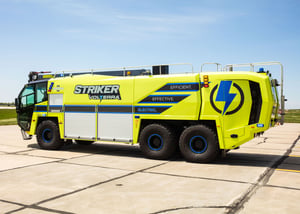 Striker Volterra Electric ARFF parked outside on a sunny day.
