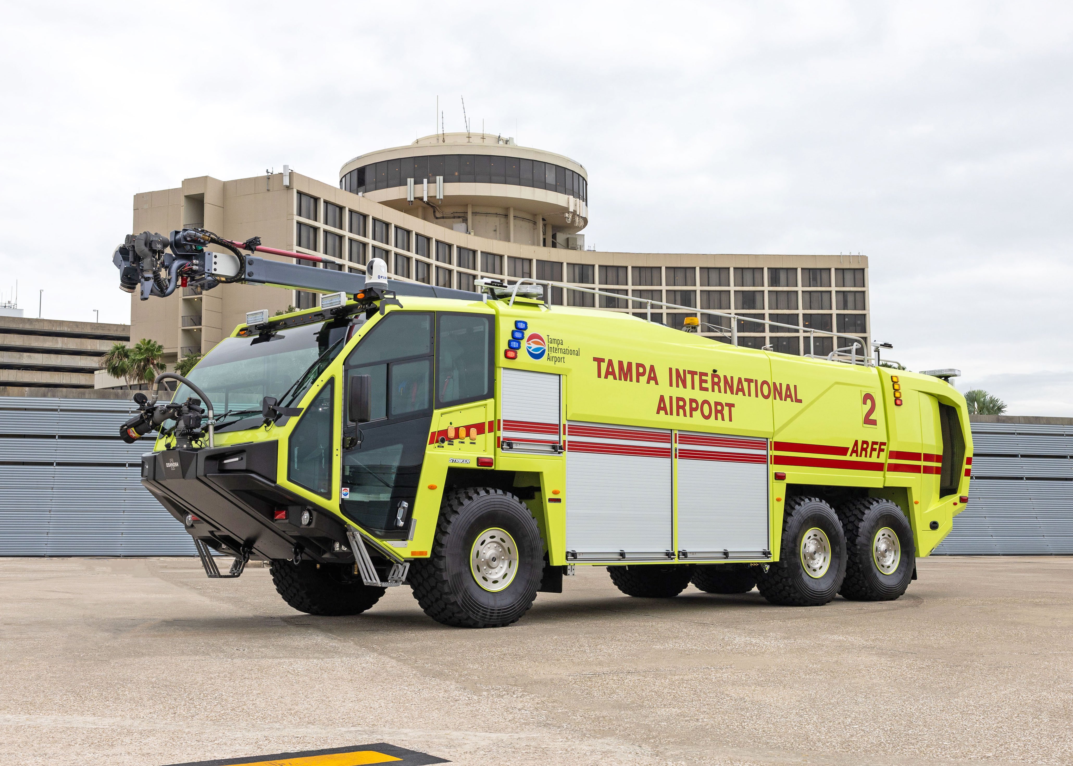 Striker 6x6 ARFF for Tampa International Airport parked outside on a cloudy day.