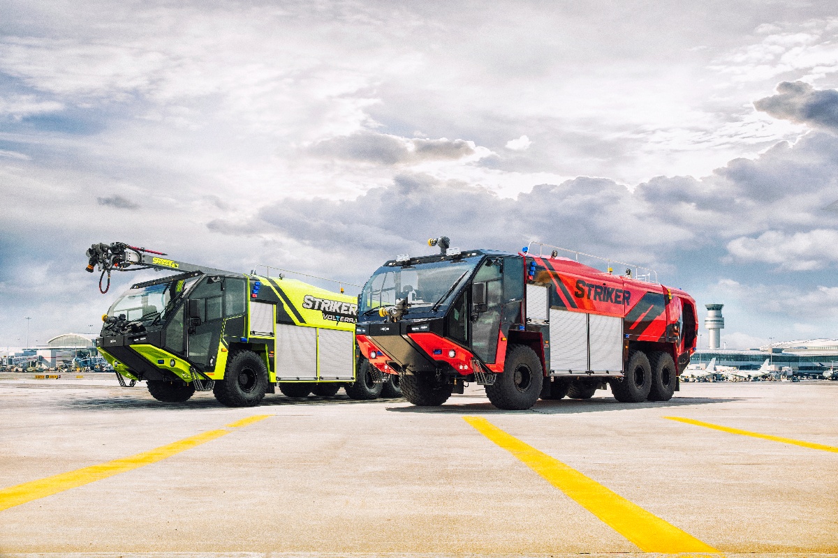 Yellow Striker Volterra next to a red Striker on a runway.