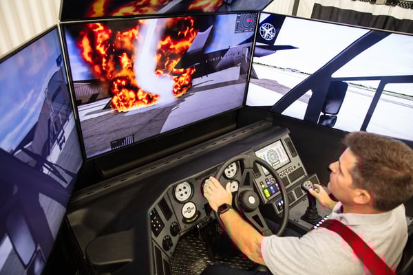 Man operating Striker Simulator