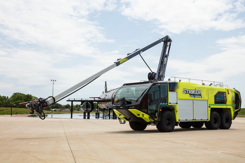 Oshkosh Striker Volterra electric ARFF truck with Snozzle turret extended.