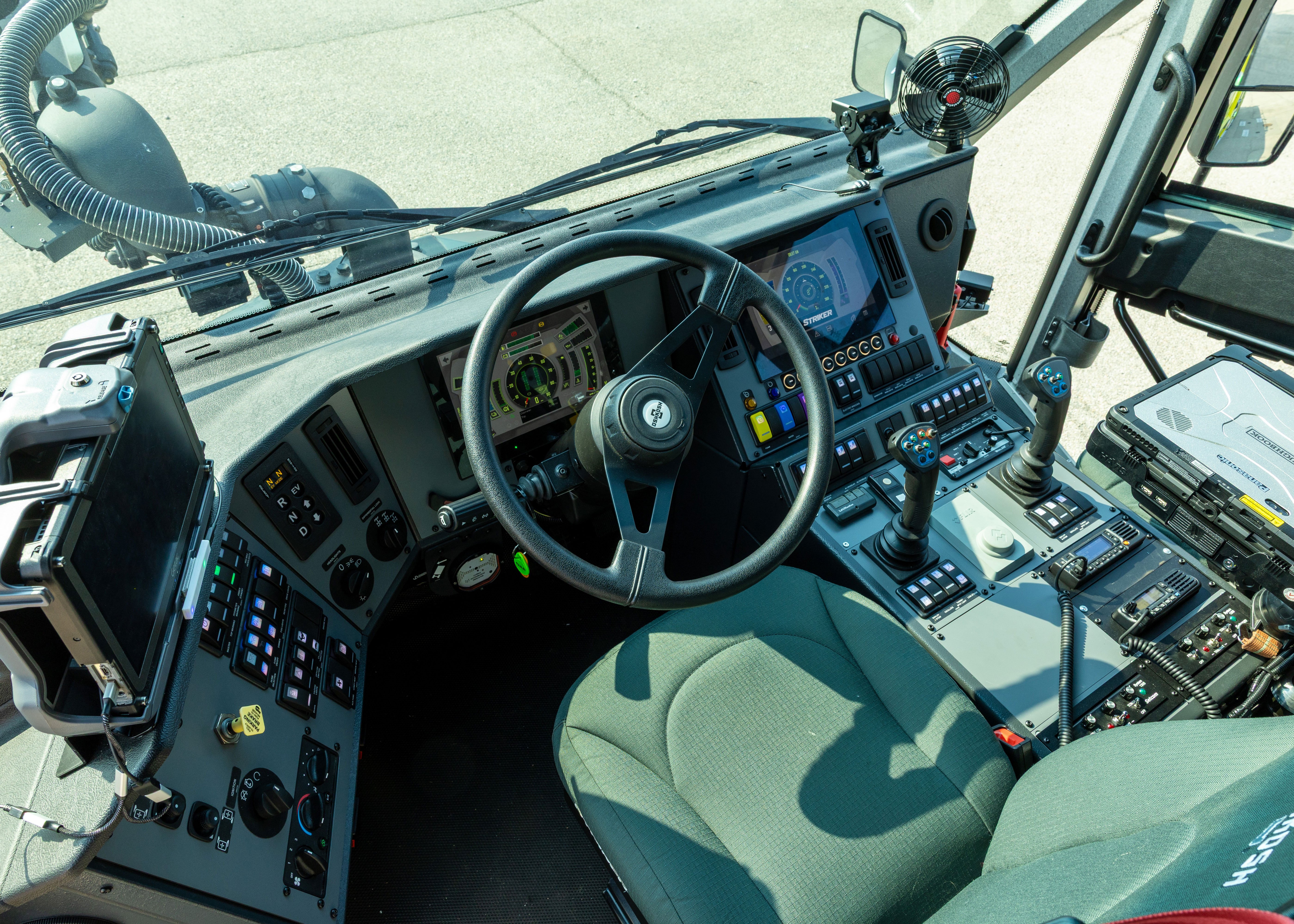 The interior driver's seat in a Striker ARFF vehicle.