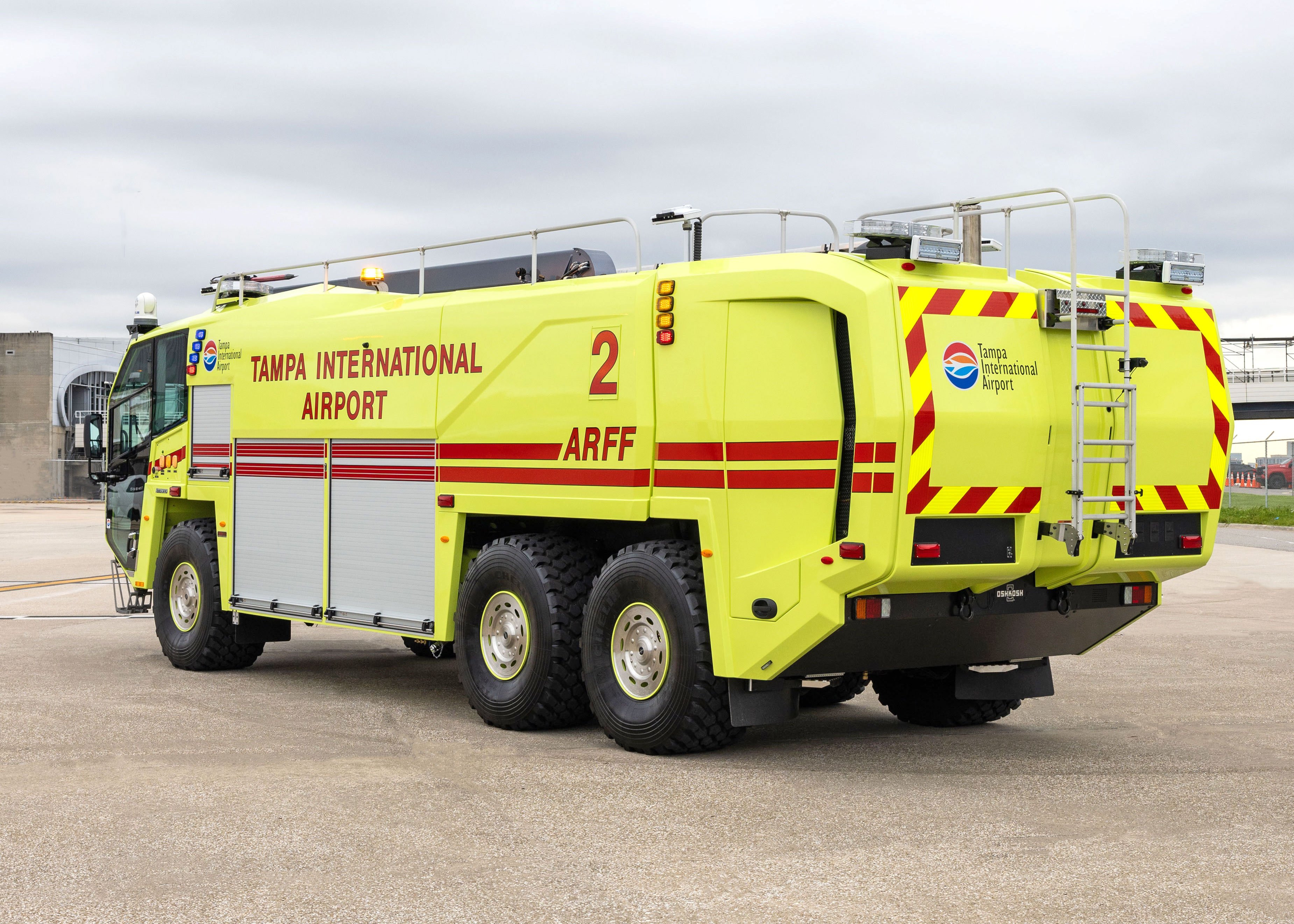 Striker 6x6 ARFF for Tampa International Airport parked outside on a cloudy day.