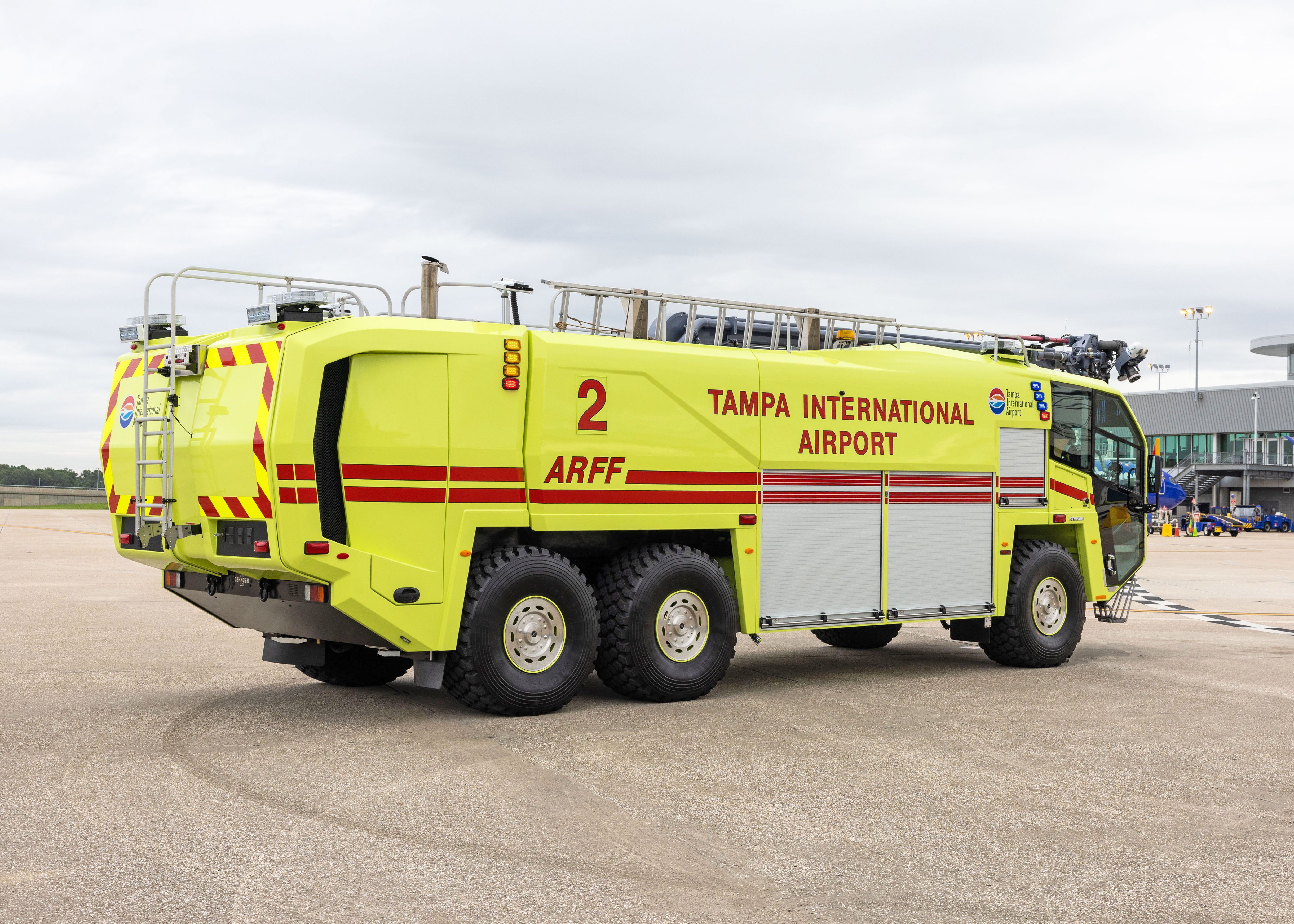 Striker 6x6 ARFF for Tampa International Airport parked outside on a cloudy day.