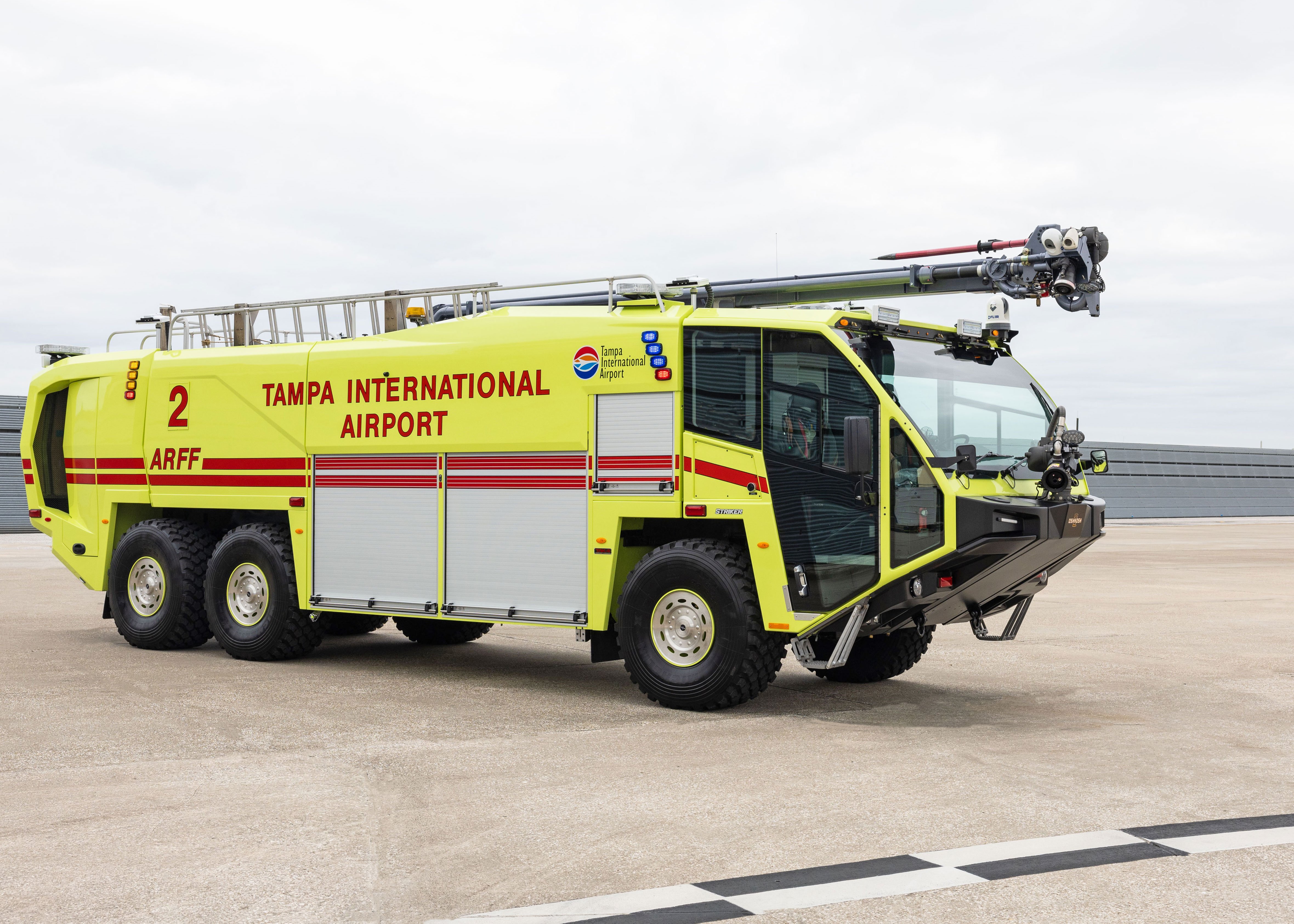 Striker 6x6 ARFF for Tampa International Airport parked outside on a cloudy day.