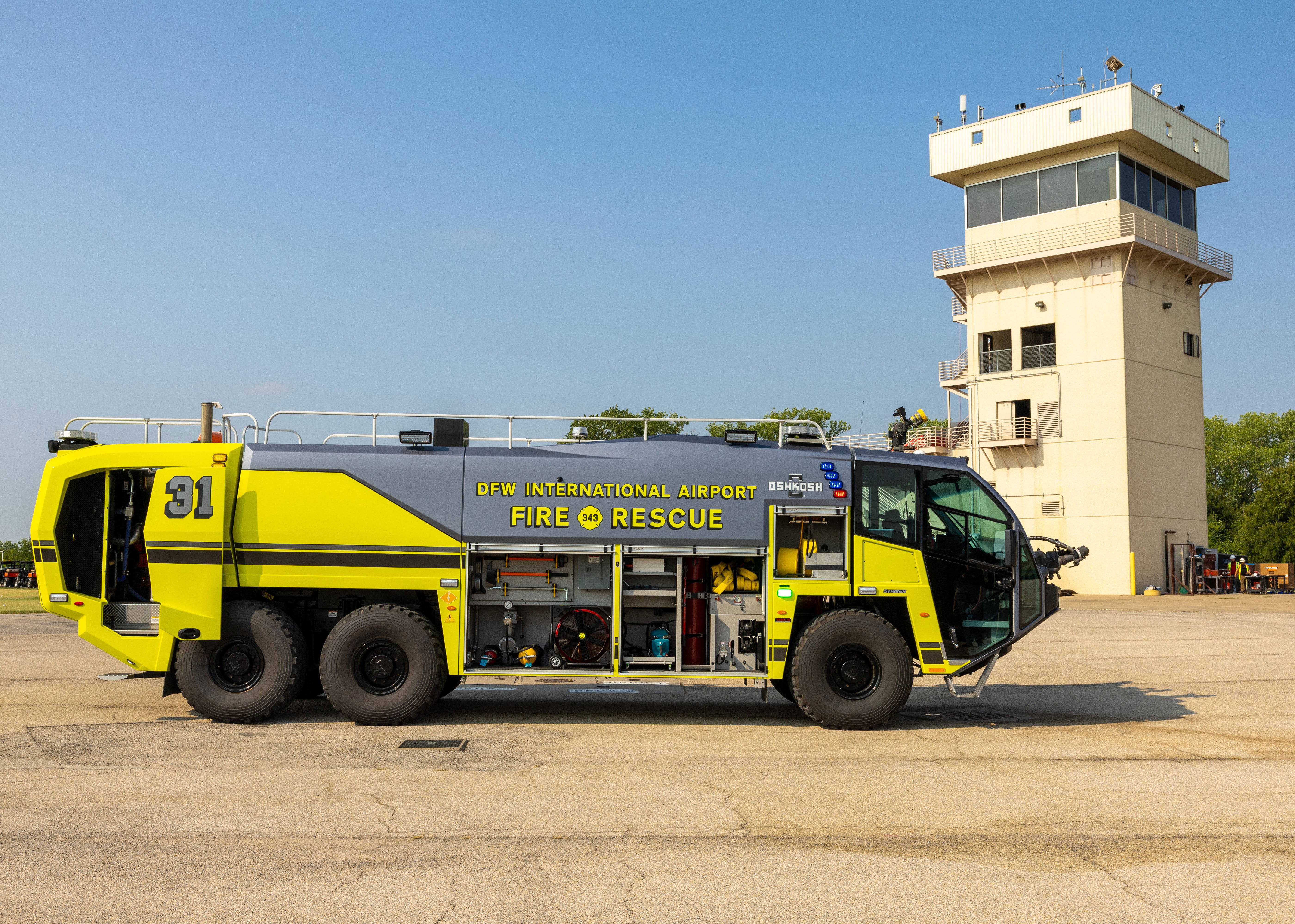 A Striker Volterra Electric ARFF parked outside on a sunny day.
