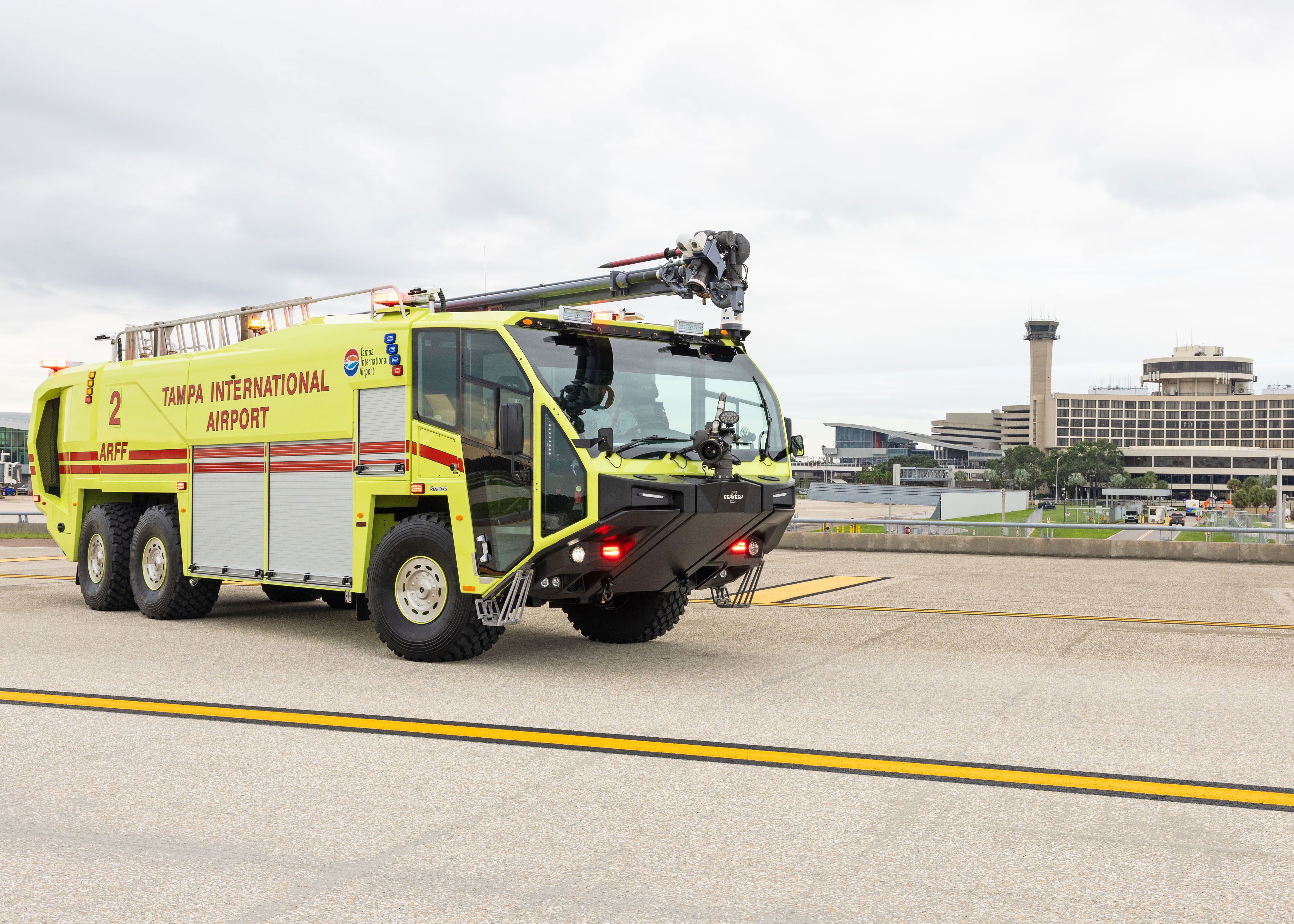 Striker 6x6 ARFF for Tampa International Airport parked outside on a cloudy day.