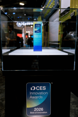 The CES 2026 Best of Innovation Award trophy for the Oshkosh Striker Volterra Electric ARFF on display.