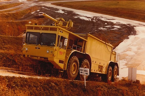 Vintage Oshkosh Airport ARFF going up a hill