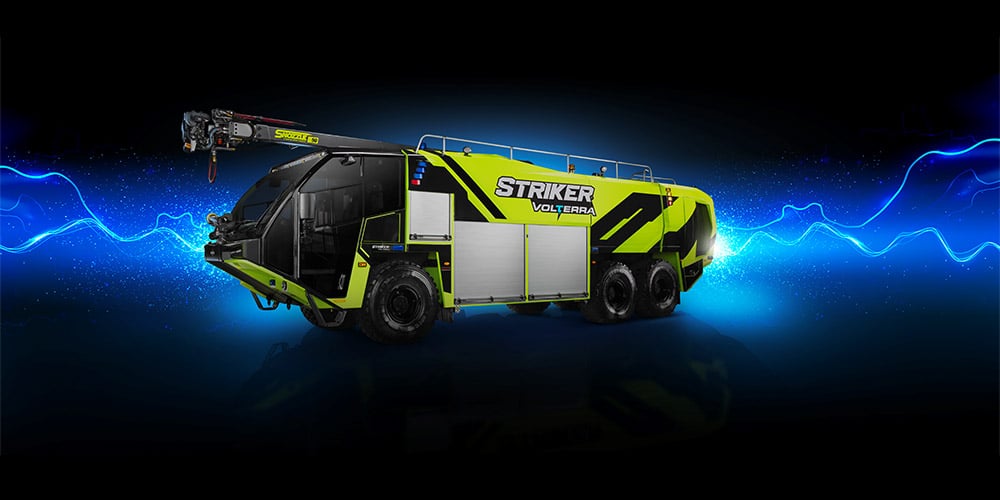 Striker Volterra electric ARFF with a Snozzle high reach extendable turret with blue lightning.