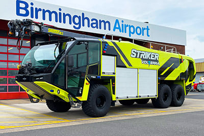 Striker Volterra electric ARFF with a Snozzle parked outside in front of Birmingham Airport.