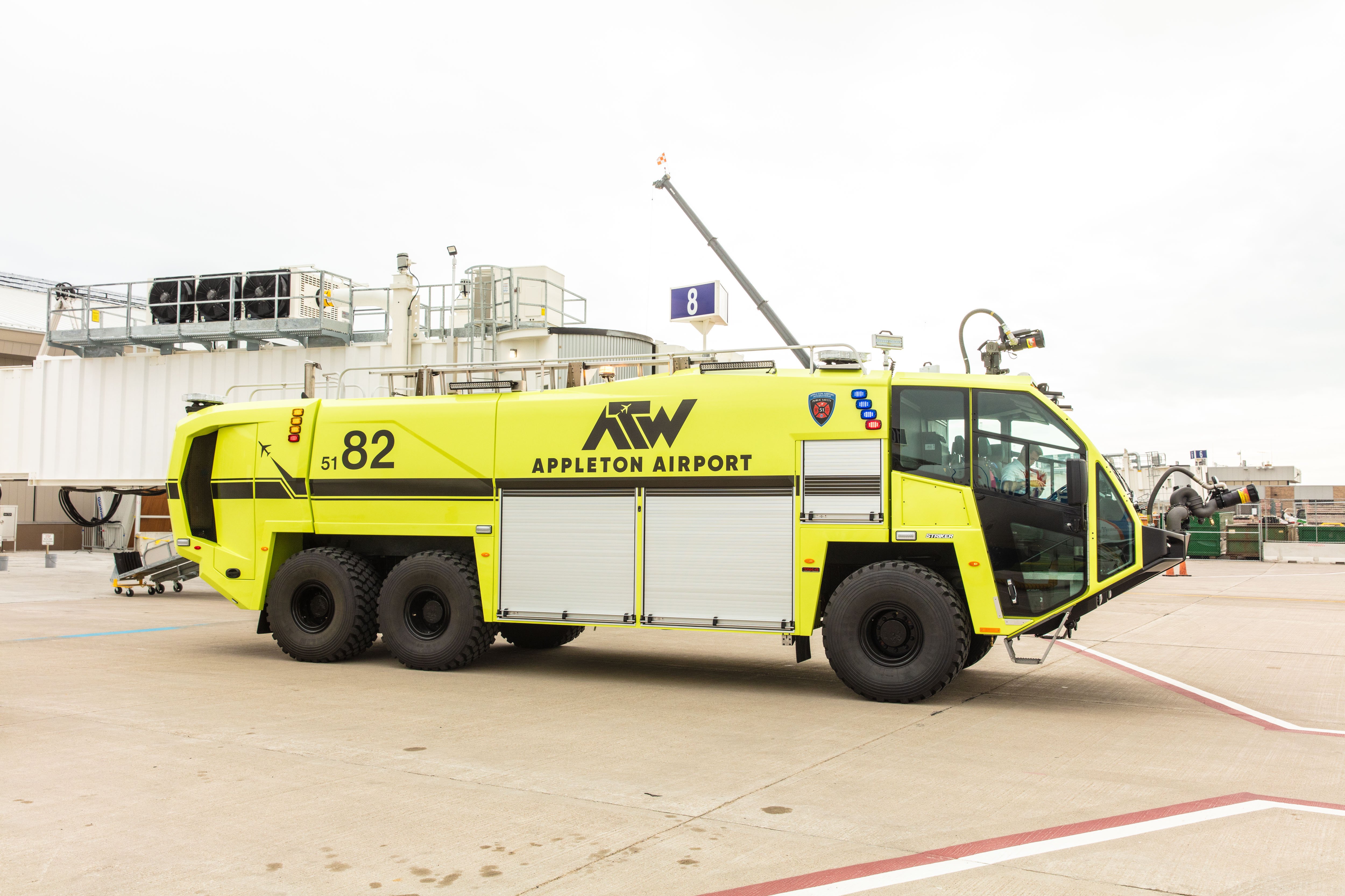 Striker 6x6 ARFF for Appleton International Airport parked outside on a cloudy day
