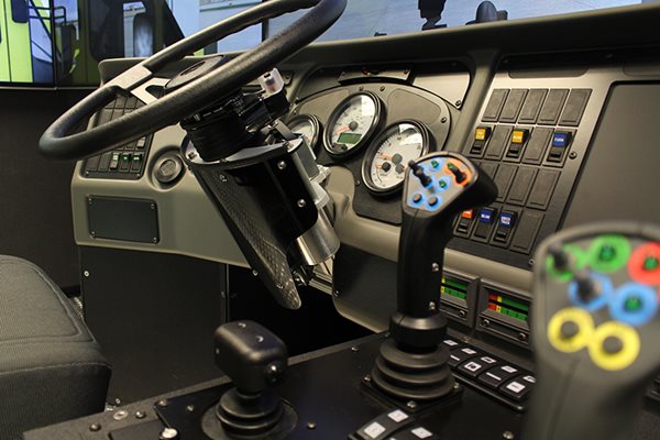 Dual joysticks and steering wheel of ARFF simulator