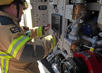 ARFF Firefighter utilizing the Oshkosh® ECO EFP™ System.