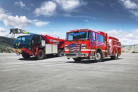 Pierce's new Volterra electric pumper alongside Oshkosh Airport Products Striker Volterra electric vehicle