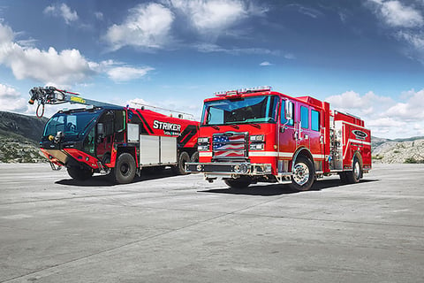 Pierce's new Volterra electric pumper alongside Oshkosh Airport Products Striker Volterra electric vehicle