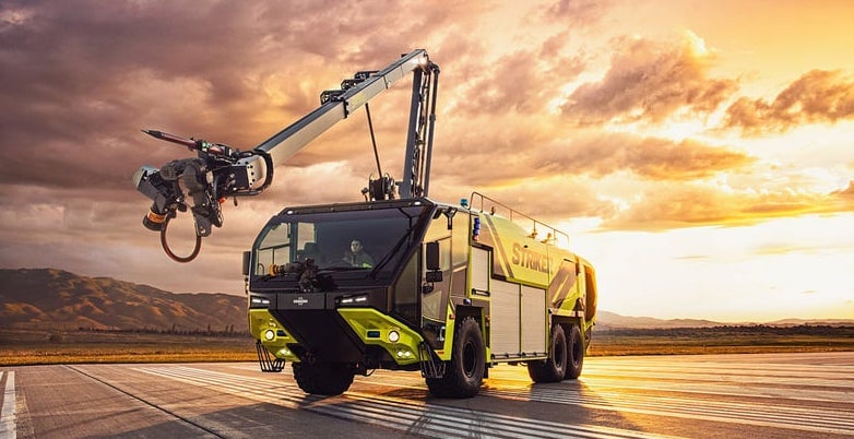 Striker truck on a runway at sunset featuring the Snozzle.