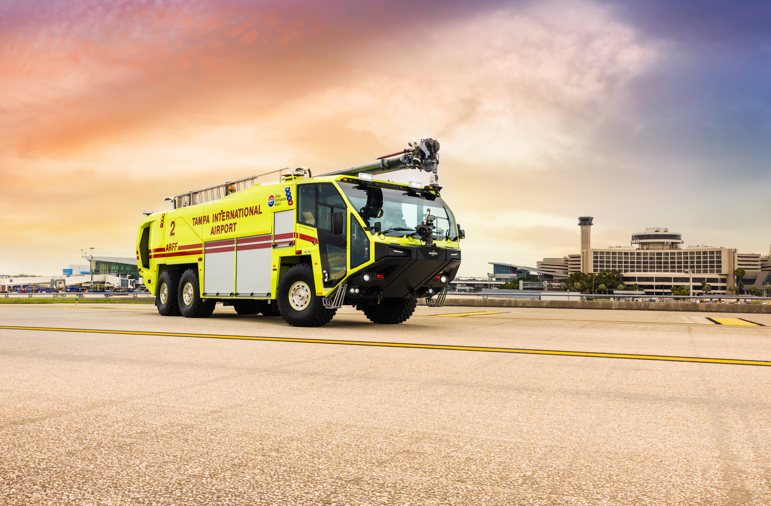 Striker 6x6 ARFF for Tampa International Airport parked outside at sunset.