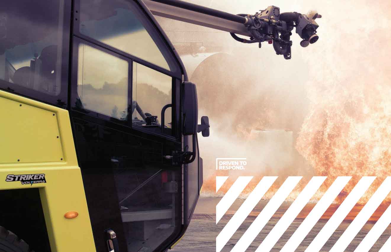 A Striker Volterra Electric ARFF approaching a fire scene.
